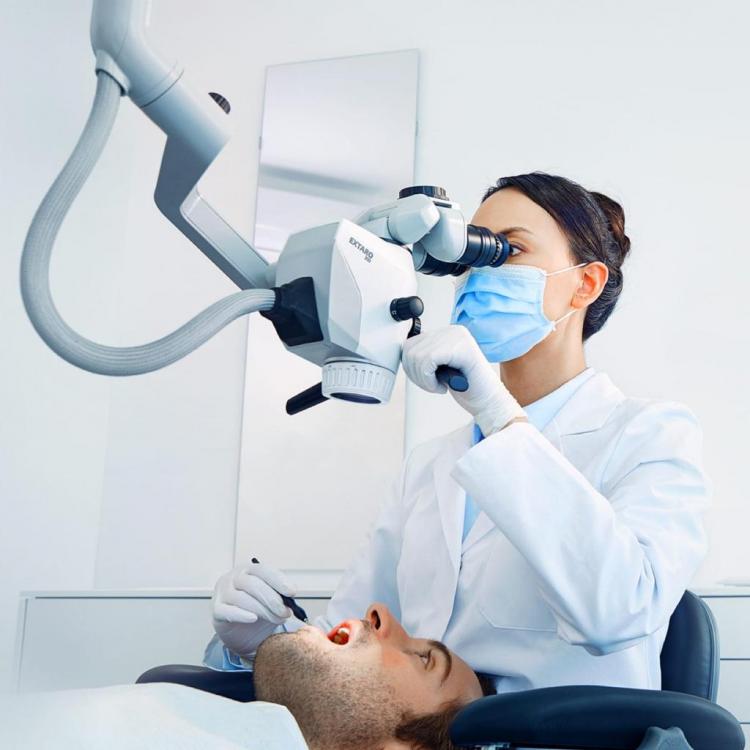 Root canal under microscope in Chisinau — 1